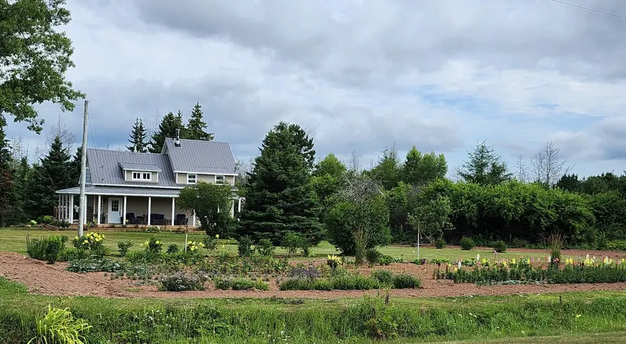 The farmhouse and gardens at 480 Abney Road